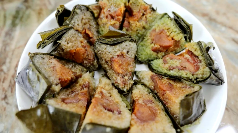 Zongzi de porc noir de Ding’an : la superstar du Festival des bateaux-dragons à Hainan Zongzi de porc noir de Ding'an : la superstar du Festival des bateaux-dragons à Hainan