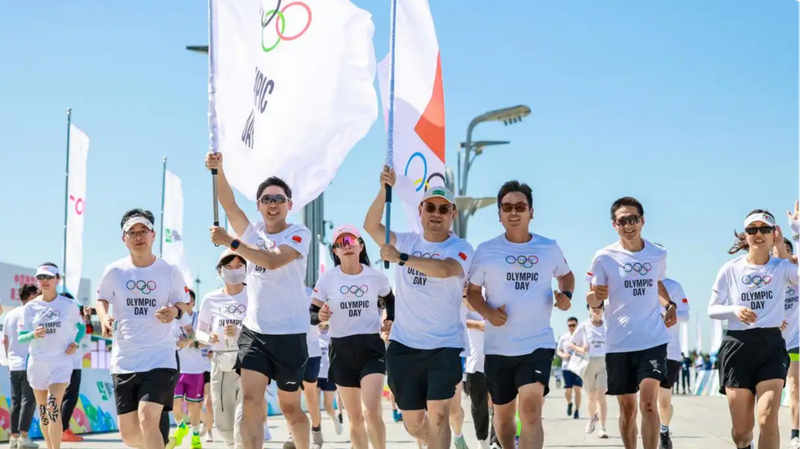 500 coureurs se préparent pour la Journée Olympique à Pékin 500 coureurs se préparent pour la Journée Olympique à Pékin
