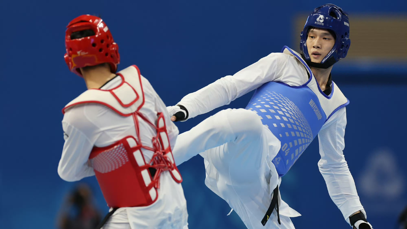 Xiang_Qizhang_remporte_l_argent_chez_les_hommes_80kg_aux_Championnats_du_Monde_de_Taekwondo