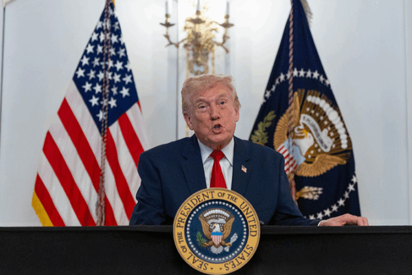 Le suspect de la fusillade de la Garde nationale accusé alors que Trump promet un gel de la migration